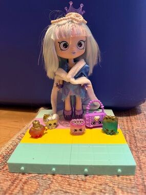 Shopkins Mini Doll in Purple & White Coat with Pastel Hair